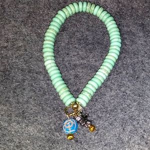 Green moon bead with charms